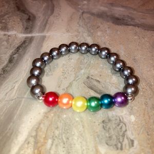 Rainbow glass PRIDE gray bracelet: 6”-6 1/4”wrist. Double glued/hidden knot.